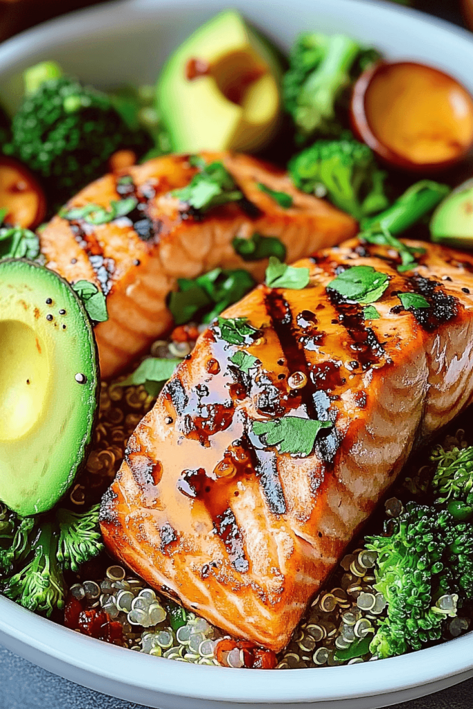 35 Grilled Salmon with Quinoa, Broccoli, and Avocado Salad